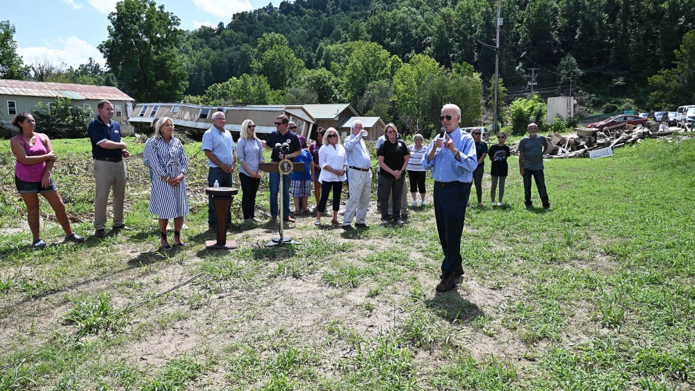 President Joe speaks after meeting with a family who lost their home to flood waters in Lost Creek, Ken. on August 8.