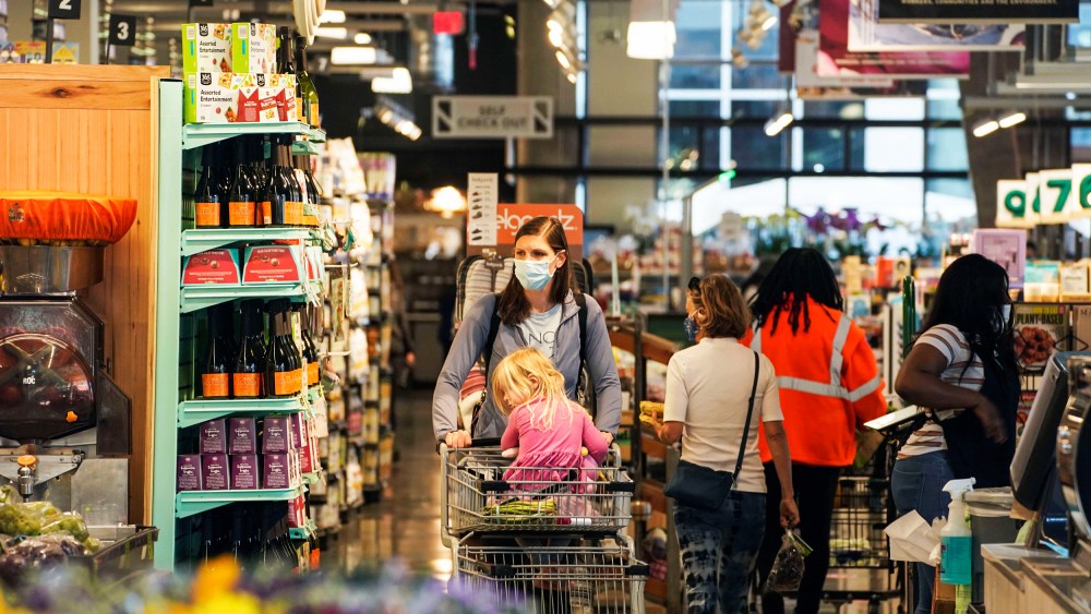 People shop in a grocery store in Washington, D.C., on Nov. 10, 2021.