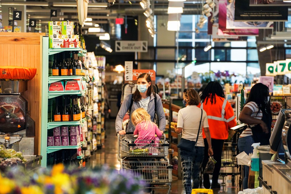 People shop in a grocery store in Washington, D.C., on Nov. 10, 2021.
