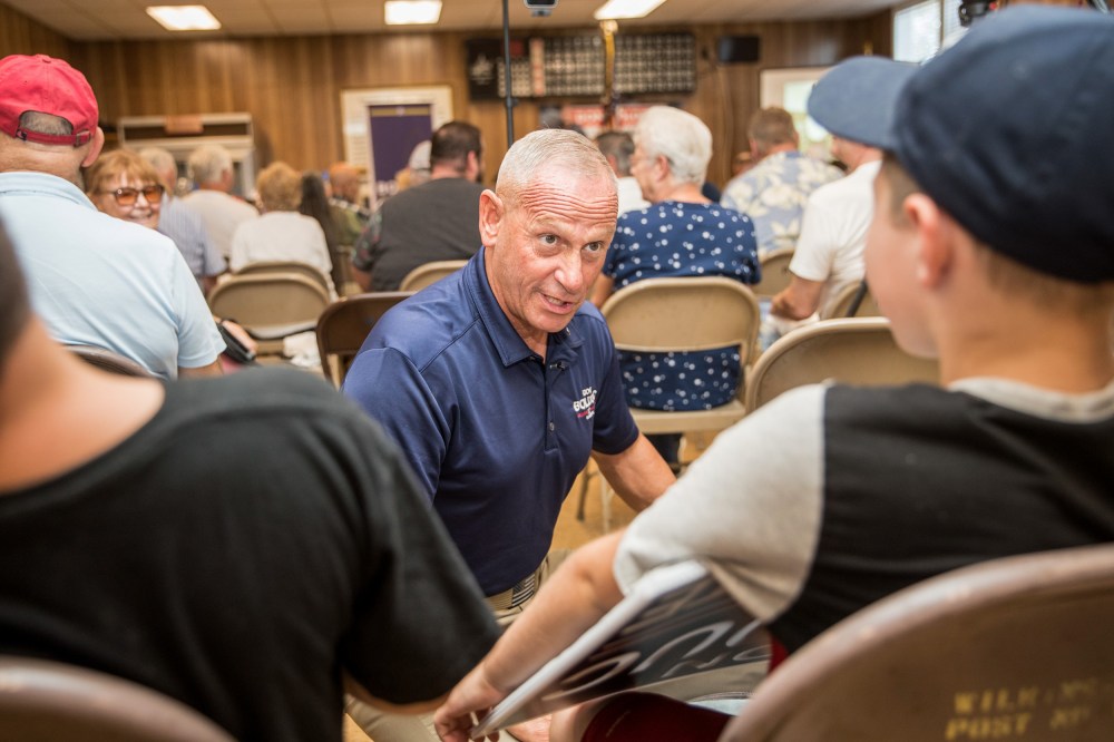 Republican Senate candidate Don Bolduc greets supporters at a town hall event on Sept. 10, 2022, in Laconia, N.H.