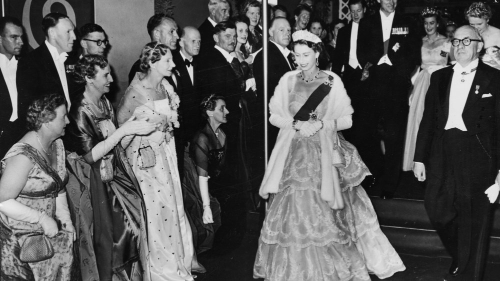 Queen Elizabeth II and the Duke of Edinburgh leave City Hall following a Civic Ball circa 1954.