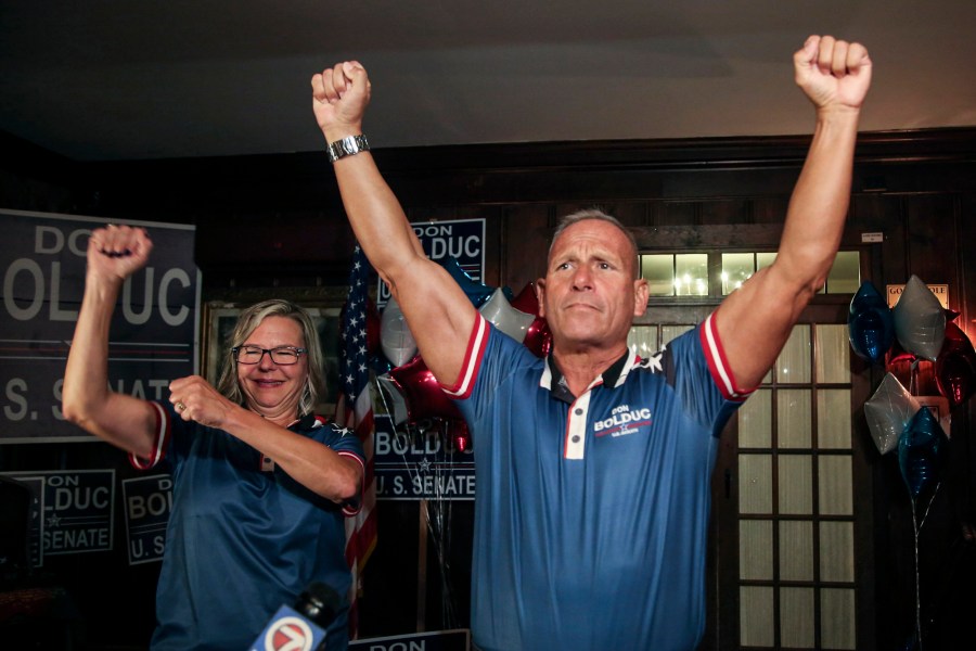 Republican Senate candidate Don Bolduc and his wife Sharon celebrate during a primary night campaign gathering on Sept. 13, 2022, in Hampton, N.H.