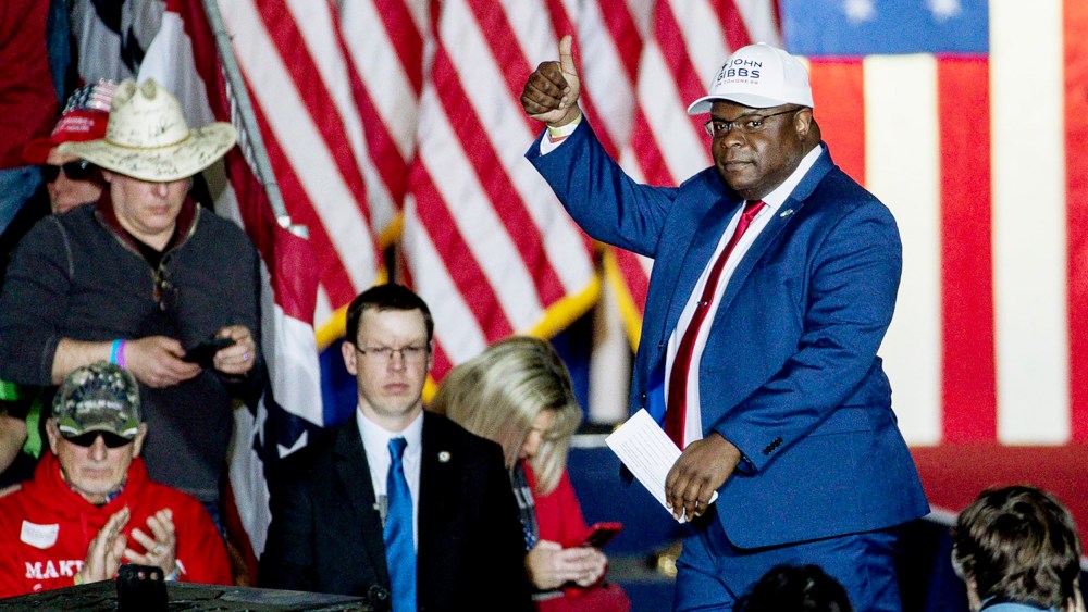 Republican House of Representative candidate John Gibbs speaks during a Save America rally at the Michigan Stars Sports Center in Washington Township on April 2.