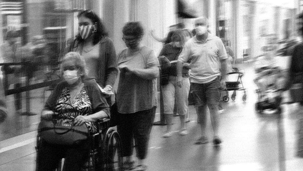 Image: Senior citizens waiting in line.
