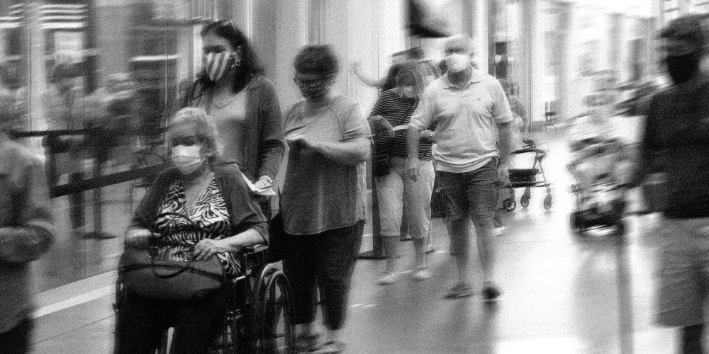 Image: Senior citizens waiting in line.