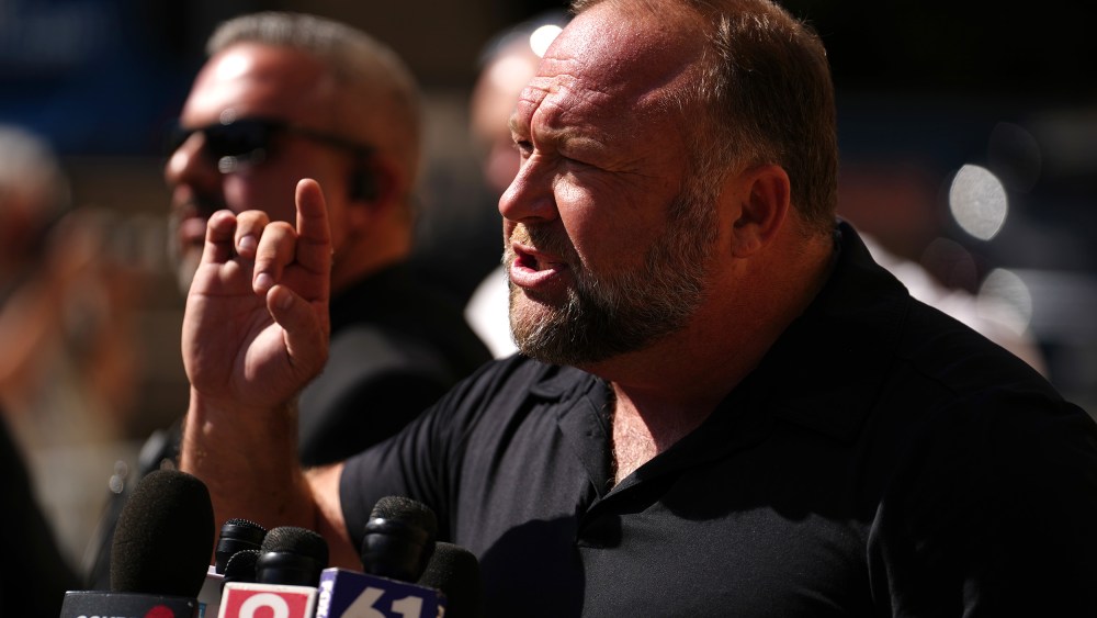 Image: InfoWars founder Alex Jones speaks to the media outside the Waterbury Superior Court during the Sandy Hook trial.