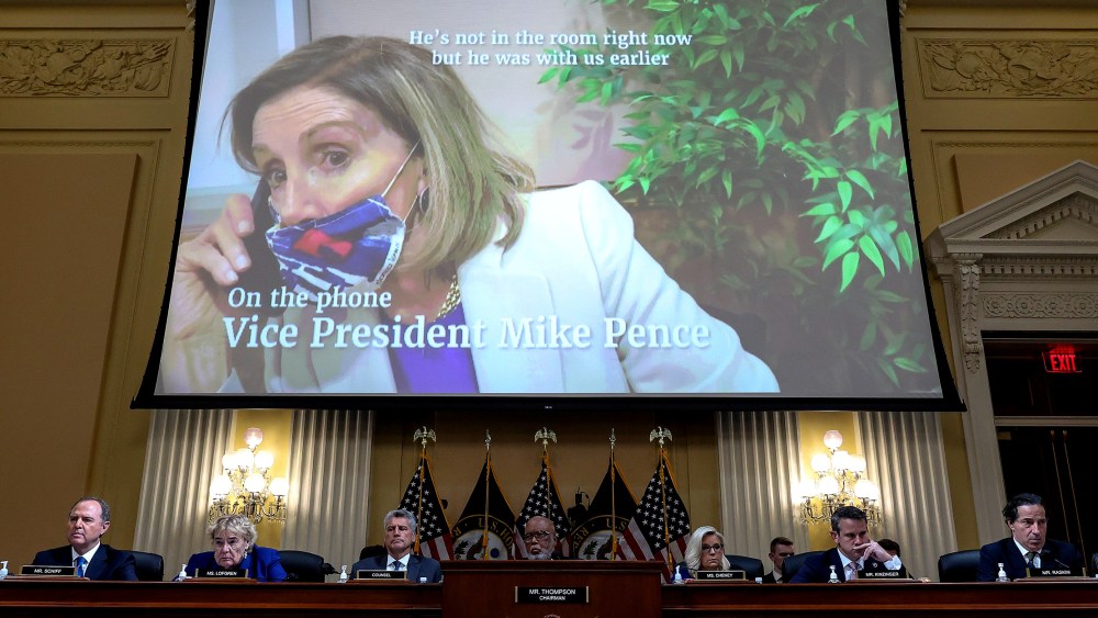 Image: A screen shows Speaker of the House Nancy Pelosi on the phone with Vice President Mike Pence as the House Select Committee to Investigate the January 6th Attack on the U.S. Capitol listens.