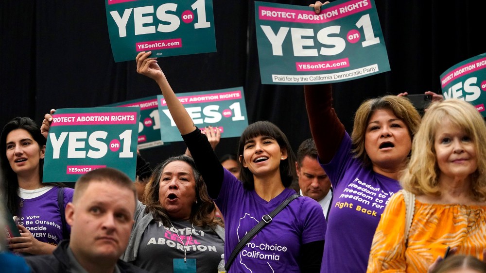Image: Supporters of California's Proposition 1 hold a rally in Lond Beach on Nov. 6, 2022. Californians voted to pass Proposition 1, a constitutional amendment that protects abortion and contraception rights, on Tuesday.