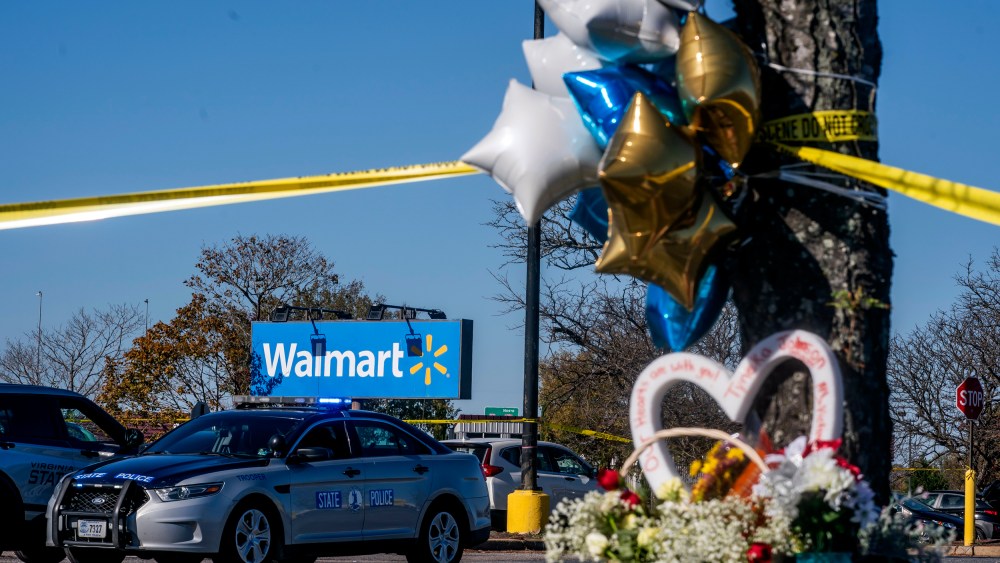 Image: A makeshift memorial outside of a Walmart where six people were fatally shot on Nov. 23, 2022.