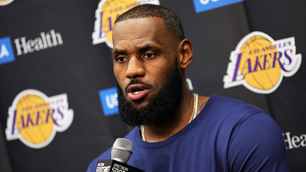 Image:  LeBron James speaks during a news conference.