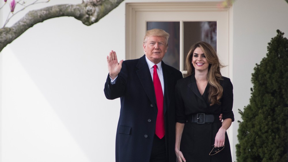 Image: President Donald J. Trump waves beside White House Communications Director Hope Hicks as he walks from the Oval Office to board Marine One to depart from the South Lawn of the White House