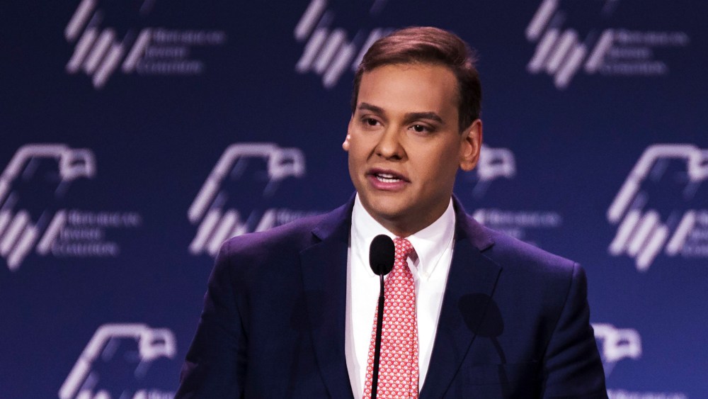 Image: George Santos addresses a Republican Jewish Coalition meeting.