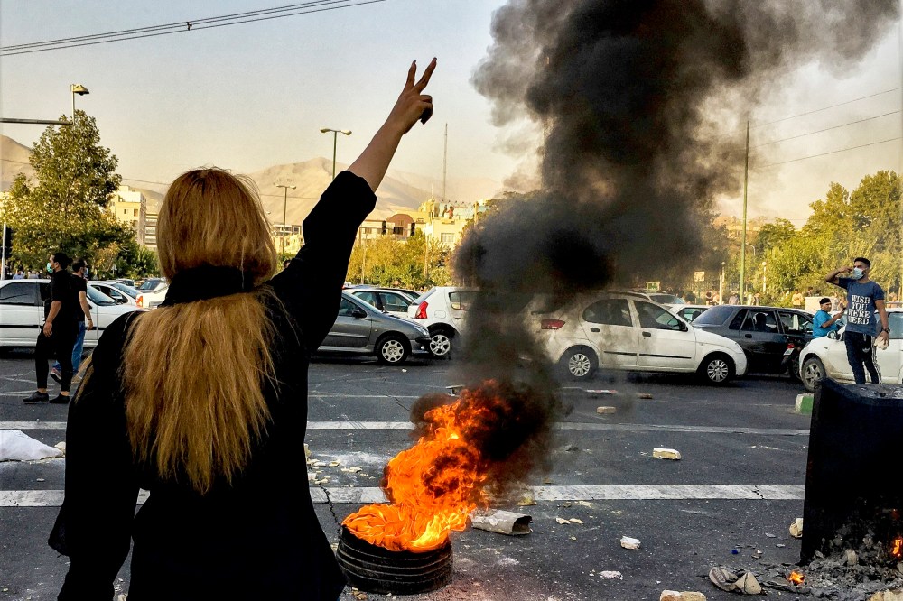 Iranians protests the death of 22-year-old Mahsa Amini in Tehran, on Oct. 1, 2022.