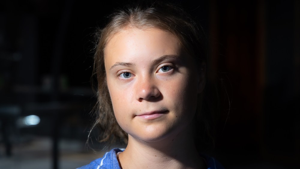 Image: Climate activist Greta Thunberg poses for a photo at the Natural History Museum in London, England.