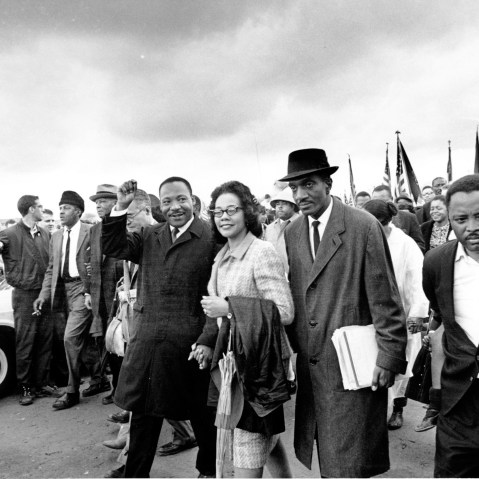 Dr. Martin Luther King Jr., his wife, Coretta Scott King, and Reverend F.D. Reese lead off the final lap to the state capitol at Montgomery, Ala., on March 25, 1965.