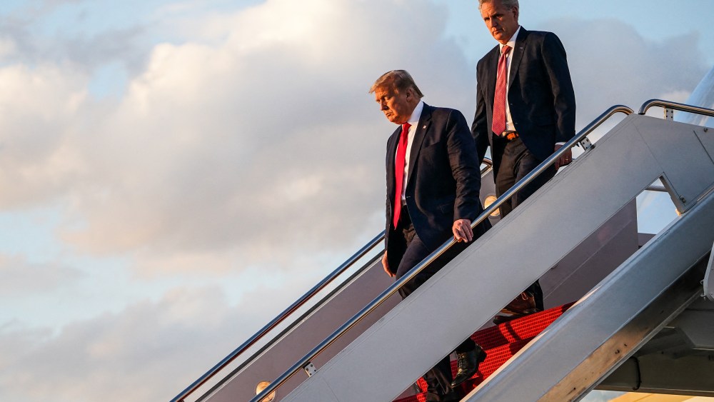 Then-President Donald Trump followed by Rep. Kevin McCarthy, R-Calif., steps off Air Force One after returning from Cape Canaveral on May 30, 2020 at Joint Base Andrews, Md.
