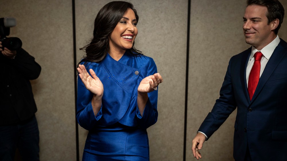 IMage: Anna Paulina Luna, the Republican candidate in Florida's 13th Congressional District, arrives with her husband to her election night party in St. Petersburg on Nov. 8, 2022.