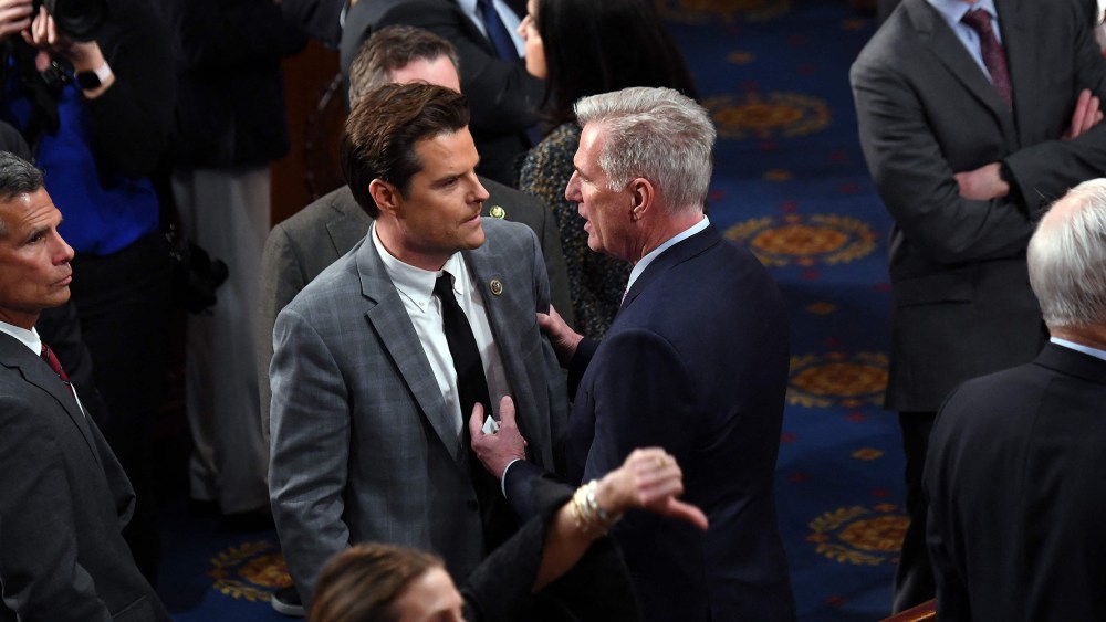 Image: Rep. Kevin McCarthy speaks to Rep. Matt Gaetz in the House Chamber.
