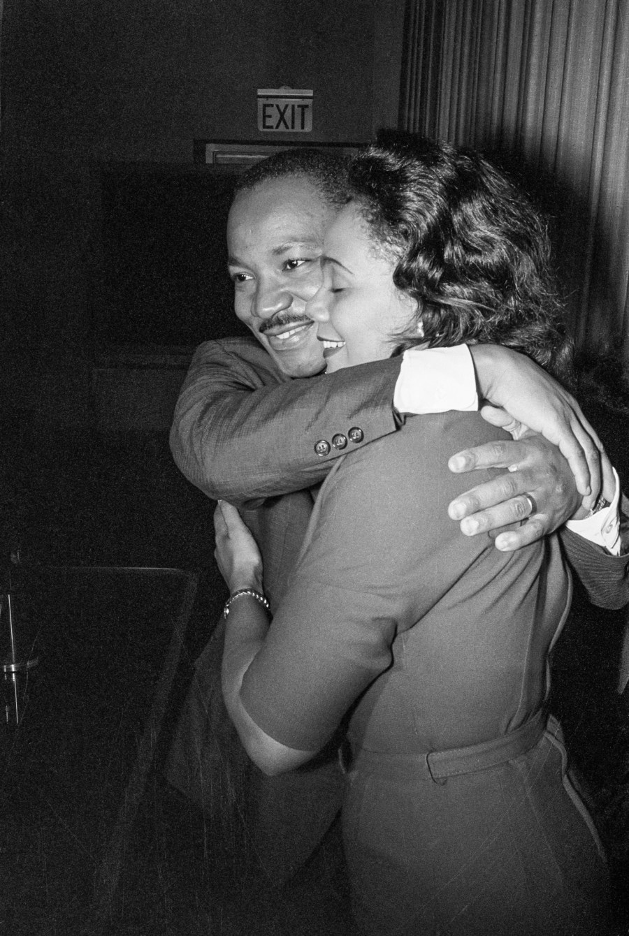 Dr. Martin Luther King, Jr. hugs his wife Coretta during a news conference following the announcement that he had been awarded the Nobel Peace Prize on 	Oct. 14, 1964.