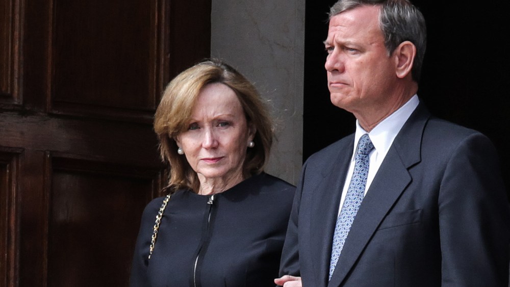 Supreme Court Chief Justice John Roberts and his wife Jane Roberts leave the Basilica of the National Shrine of the Immaculate Conception following the funeral of Associate Justice Antonin Scalia Feb. 20, 2016 in Washington, DC.