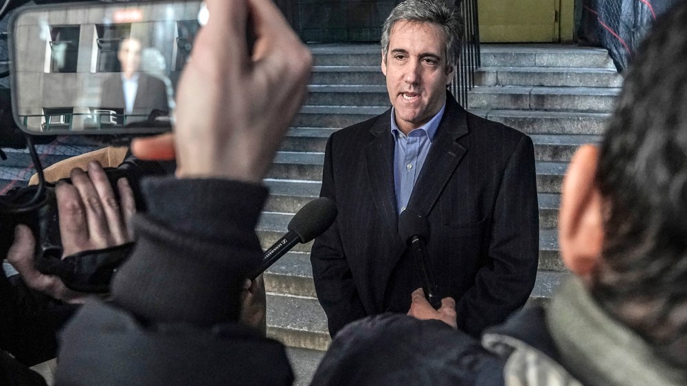 Michael Cohen briefs reporters after meeting with Manhattan prosecutors on Feb. 8, 2023.