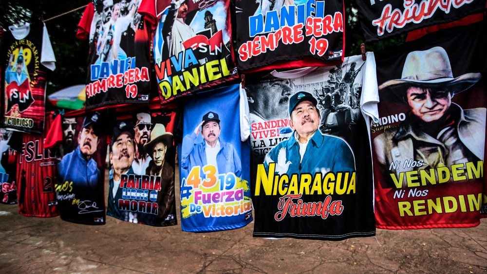 T-shirts with images of Nicaraguan President Daniel Ortega are sold at a bus station on the eve of the 43rd anniversary of the Nicaraguan Revolution in Managua, on July 18, 2022.