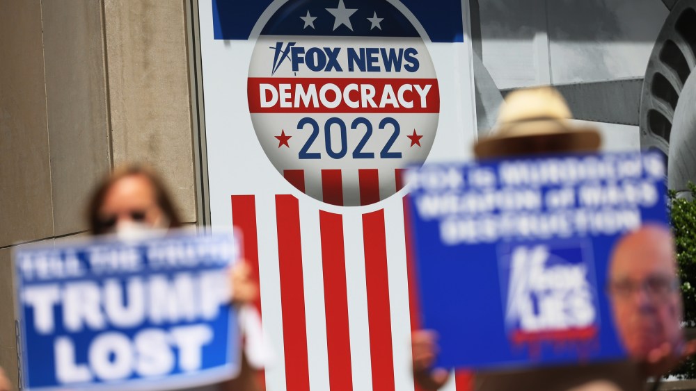 People protest outside Fox News headquarters in New York