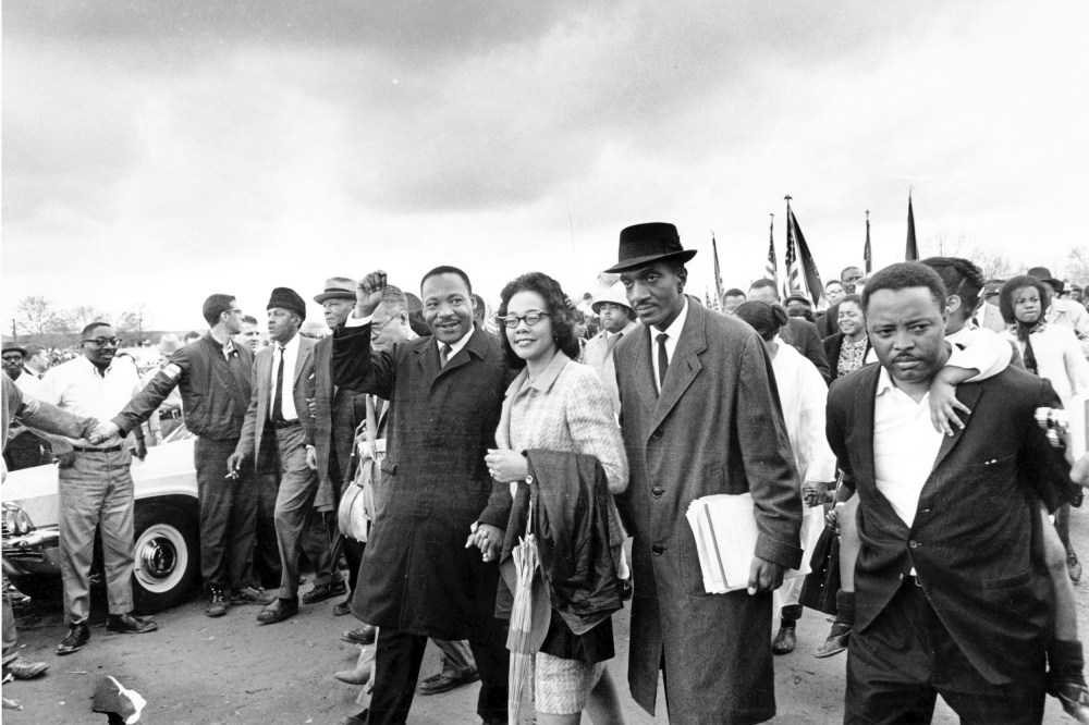 Dr. Martin Luther King Jr., and his wife, Coretta Scott King, lead off the final lap to the state capitol at Montgomery, Ala., in 1965 as thousands of civil rights marchers joined in the walk to demand voter registration rights.