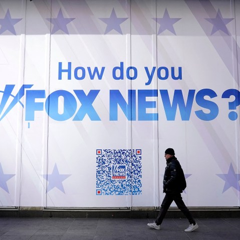 A person walks past the Fox News headquarters in New York City
