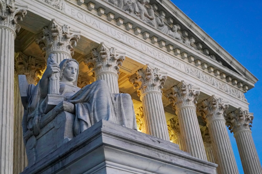 Detail shot of the Supreme Court
Light illuminates part of the Supreme Court building on Capitol Hill in Washington, Nov. 16, 2022. The Supreme Court will decide whether a disabled activist can file disability rights lawsuits against hotels she doesn't intend to visit.