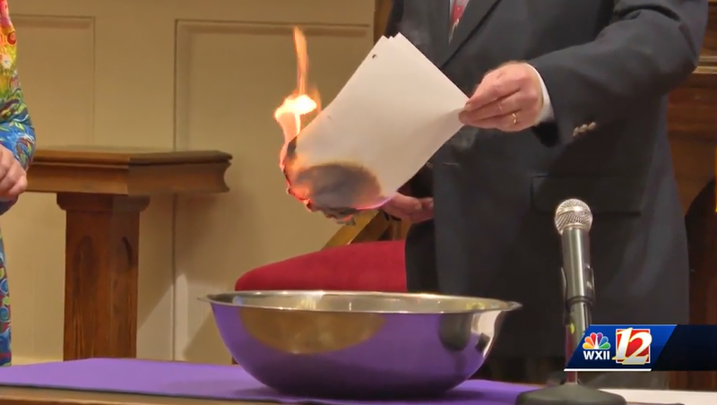 The congregation of Trinity Moravian of Winston-Salem, N.C., holds a ceremony to erase the medical debt of more than 3, 300 people.