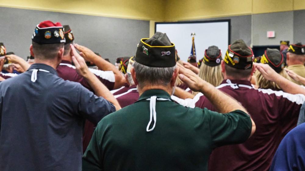 Veterans salute the flag Veterans of Foreign Wars National Convention in Kansas City, Mo.