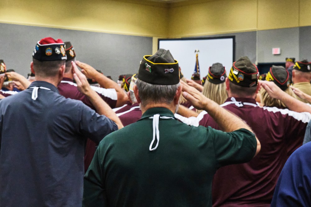 Veterans salute the flag Veterans of Foreign Wars National Convention in Kansas City, Mo.