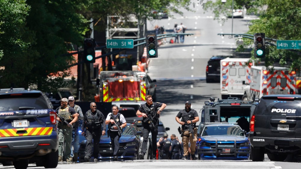 Law enforcement officers near the scene of an active shooter in Atlanta on May 3, 2023.