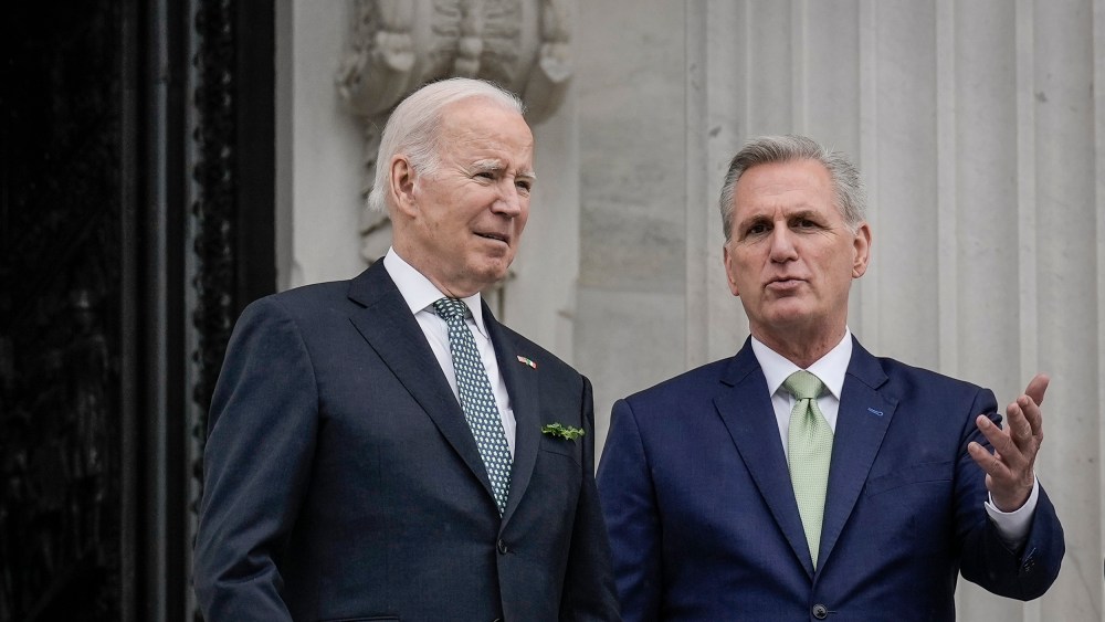 President Joe Biden and Speaker of the House Kevin McCarthy leave the Capitol