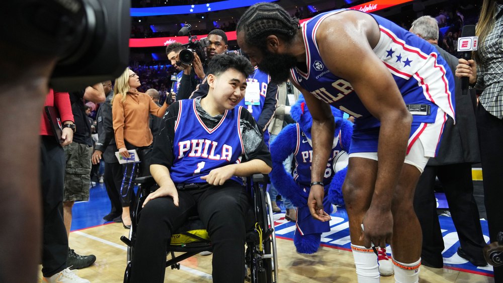 James Harden #1 of the Philadelphia 76ers and John Hao after Game Four of the Eastern Conference Semi-Finals of the 2023 NBA Playoffs against the Boston Celtics on May 7, 2023 at the Wells Fargo Center in Philadelphia, Pennsylvania.