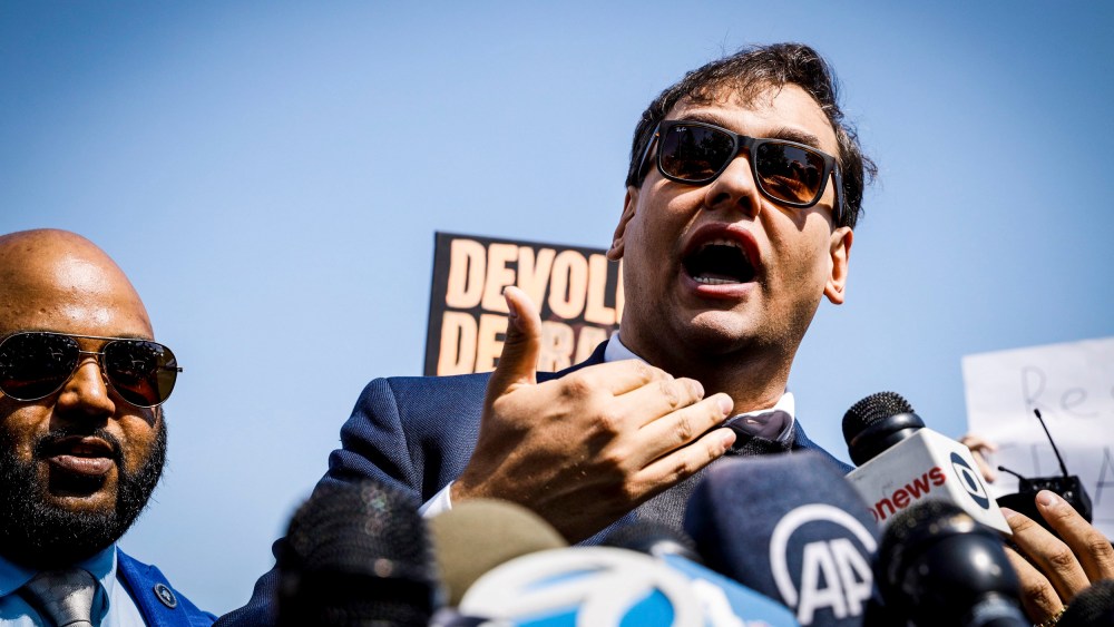 Image: Rep. George Santos, R-N.Y., speaks to the media outside the federal courthouse in Central Islip, N.Y., on May 10, 2023.