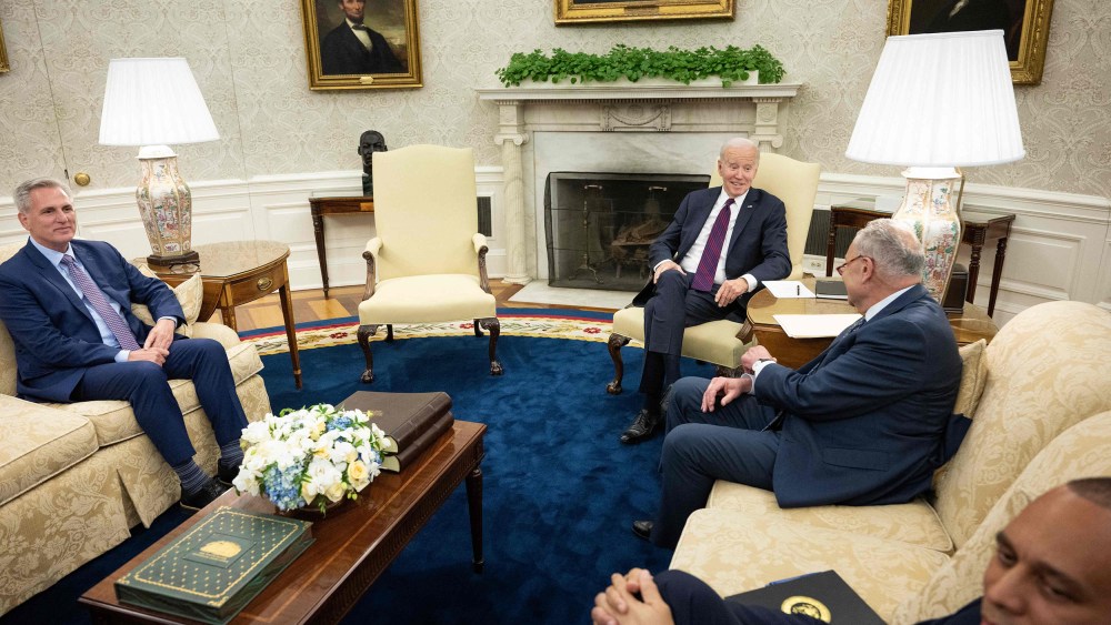 (L to R) Speaker of the House Kevin McCarthy (R-CA), US President Joe Biden, Senate Majority Leader Charles E. Schumer (D-NY), and House Minority Leader Hakeem Jeffries (D-NY) wait before a meeting about the United States's debt ceiling in the Oval Office of the White House May 9, 2023, in Washington, DC. Biden and Republican leaders met in hopes of breaking an impasse over the US debt limit. The lifting of the national debt ceiling  allows the government to pay for spending already incurred.