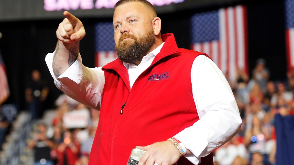 J.R. Majewski, Republican candidate for U.S. Representative for Ohio's 9th Congressional District, takes the stage at a campaign rally in Youngstown, Ohio., Saturday, Sept. 17, 2022.