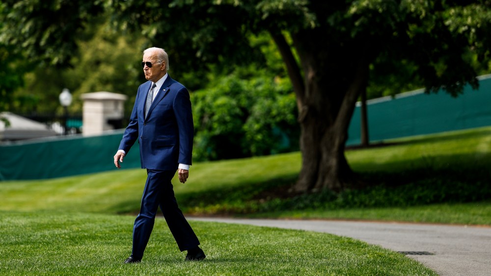 President Joe Biden walks on the South Lawn of the White House on May 10, 2023.