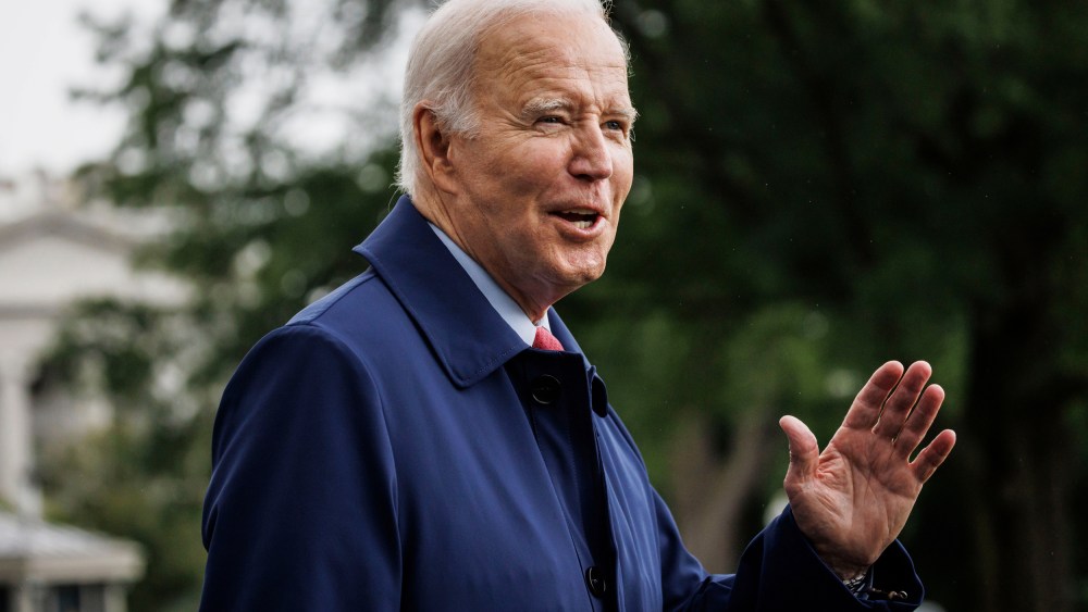 President Joe Biden speaks to members of the media on the South Lawn of the White House before boarding Marine One on May 29, 2023.