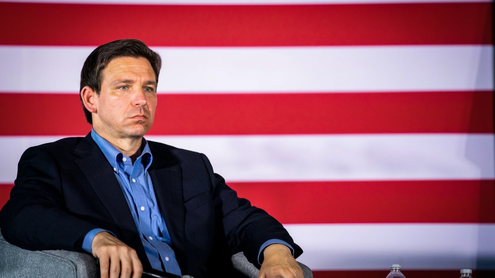 Image: Presidential candidate and Florida Governor Ron DeSantis listens to his wife speak to a crowd on June 2, 2023 in Gilbert, S.C.