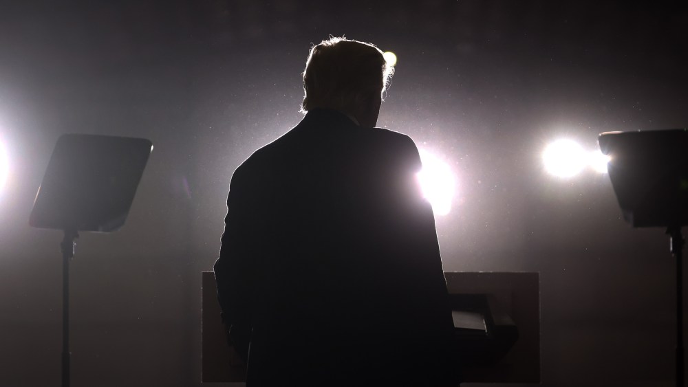 Former President Donald Trump speaks at a rally near Washington, Mich.