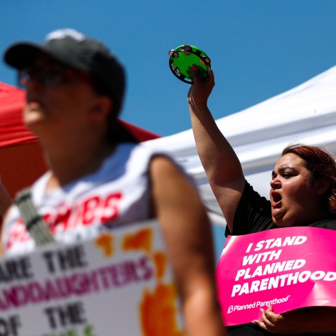 Demonstrators call for reproductive freedom at a rally