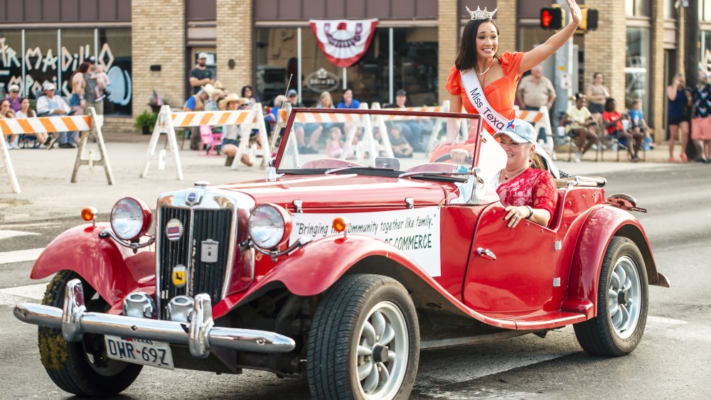 iFairfield, TX-JUNE 12: Miss Texas, Averie Bishop waves as she rides in a parade on Monday, June 12 in Fairfield, TX. Bishop, the first Filipina Miss Texas made her final stop as Miss Texas in Fairfield for a two day trip to visit local businesses and judge a local pageant. Bishop's platform of "Yall means all" had her talking a lot about diversity and inclusivity all around the state.  (Sergio Flores for The Washington Post via Getty Images)