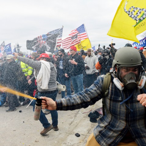 Rioters clash with police and security forces at the Capitol