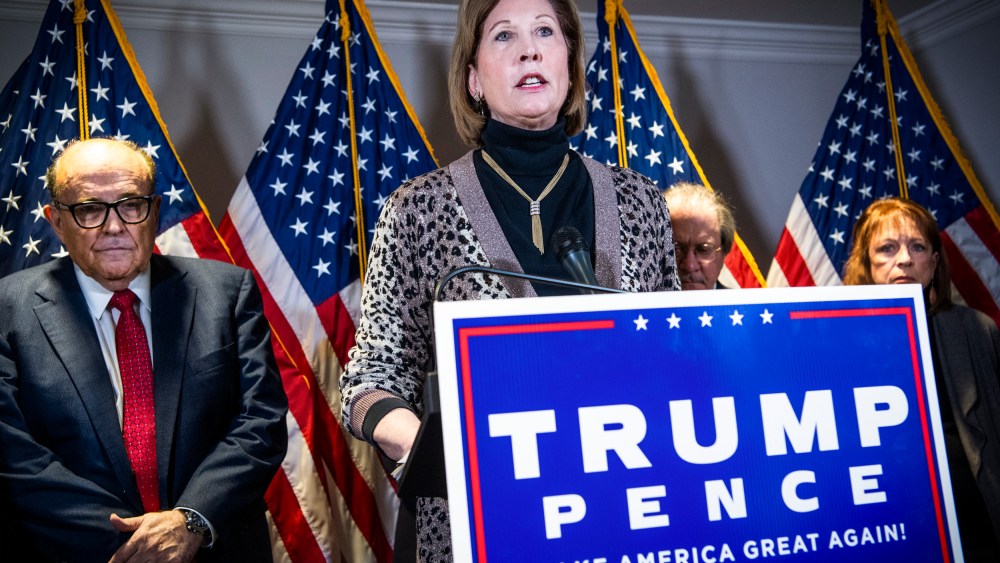 Sidney Powell, attorney for President Donald Trump, alongside attorney Rudolph Giuliani, left, conducts a news conference at the Republican National Committee on lawsuits regarding the outcome of the 2020 presidential election on Nov. 19, 2020.