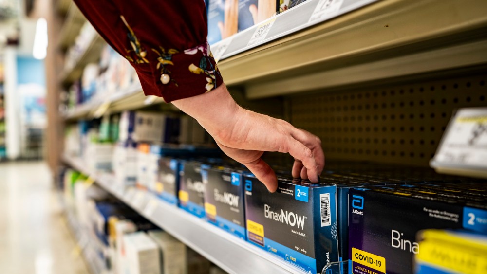 A shopper reaches for a box of Covid-19 tests in Dallas on Sept. 29, 2022.