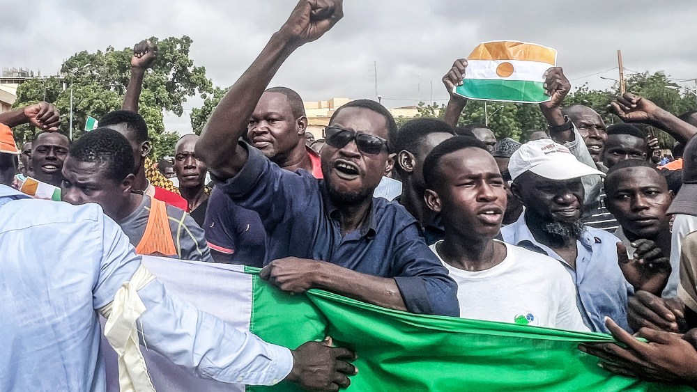Protesters gesture during a demonstration on independence day in Niamey on August 3, 2023. Security concerns built on August 3, 2023 ahead of planned protests in coup-hit Niger, with France demanding safety guarantees for foreign embassies as some Western nations reduced their diplomatic presence.