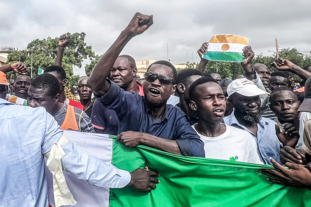 Protesters gesture during a demonstration on independence day in Niamey on August 3, 2023. Security concerns built on August 3, 2023 ahead of planned protests in coup-hit Niger, with France demanding safety guarantees for foreign embassies as some Western nations reduced their diplomatic presence.